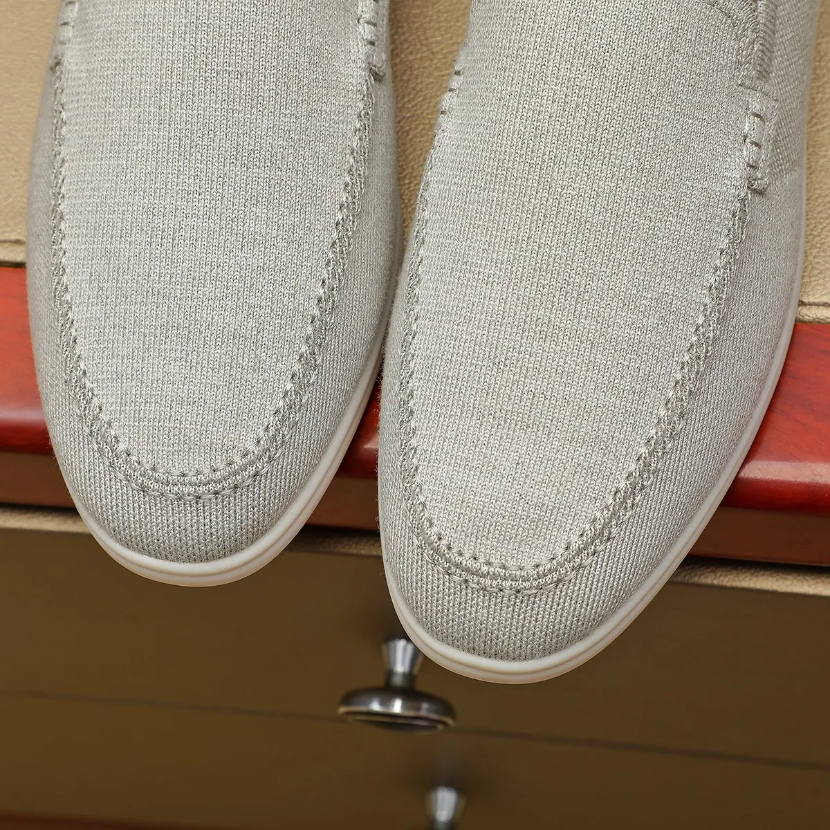 Men's Men's Shoes 💰 400 Loro PIana moccasin made of wish wool fabric. The upper is made of knitted fabric, made on a loom, and then attached to a rubber sole. The Rain System's water-repellent treatment enhances the shoe's functional design, while the suede details give the shoe a sense of elegance and sophistication. Made from Wish, fine wool from Australian and New Zealand Merino sheep 38-44